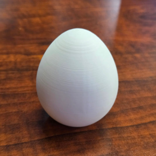 Surprise Egg Fidget Toy – Articulated Chick in an Eggshell