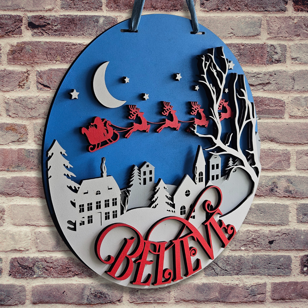 "Believe" Christmas Village Door Hanger