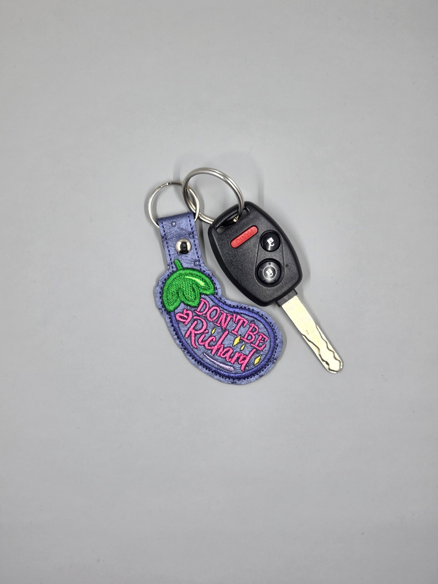 “Don’t Be a Richard” Embroidered Keychain | Funny Eggplant Vinyl Keychain