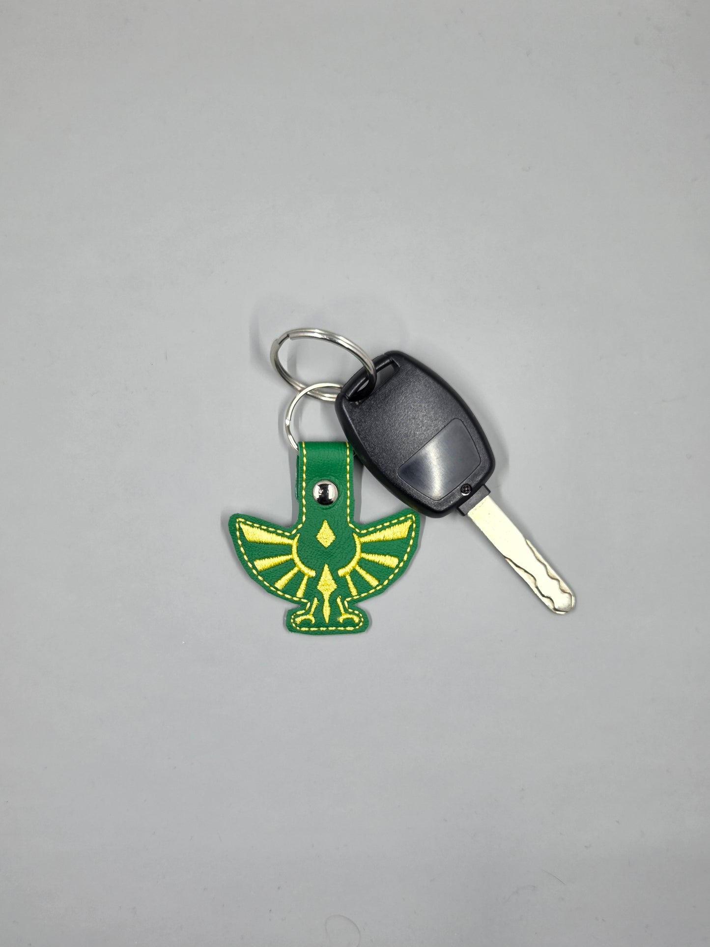 Hylian Crest Embroidered Keychain | Green & Gold Vinyl Gamer Keychain