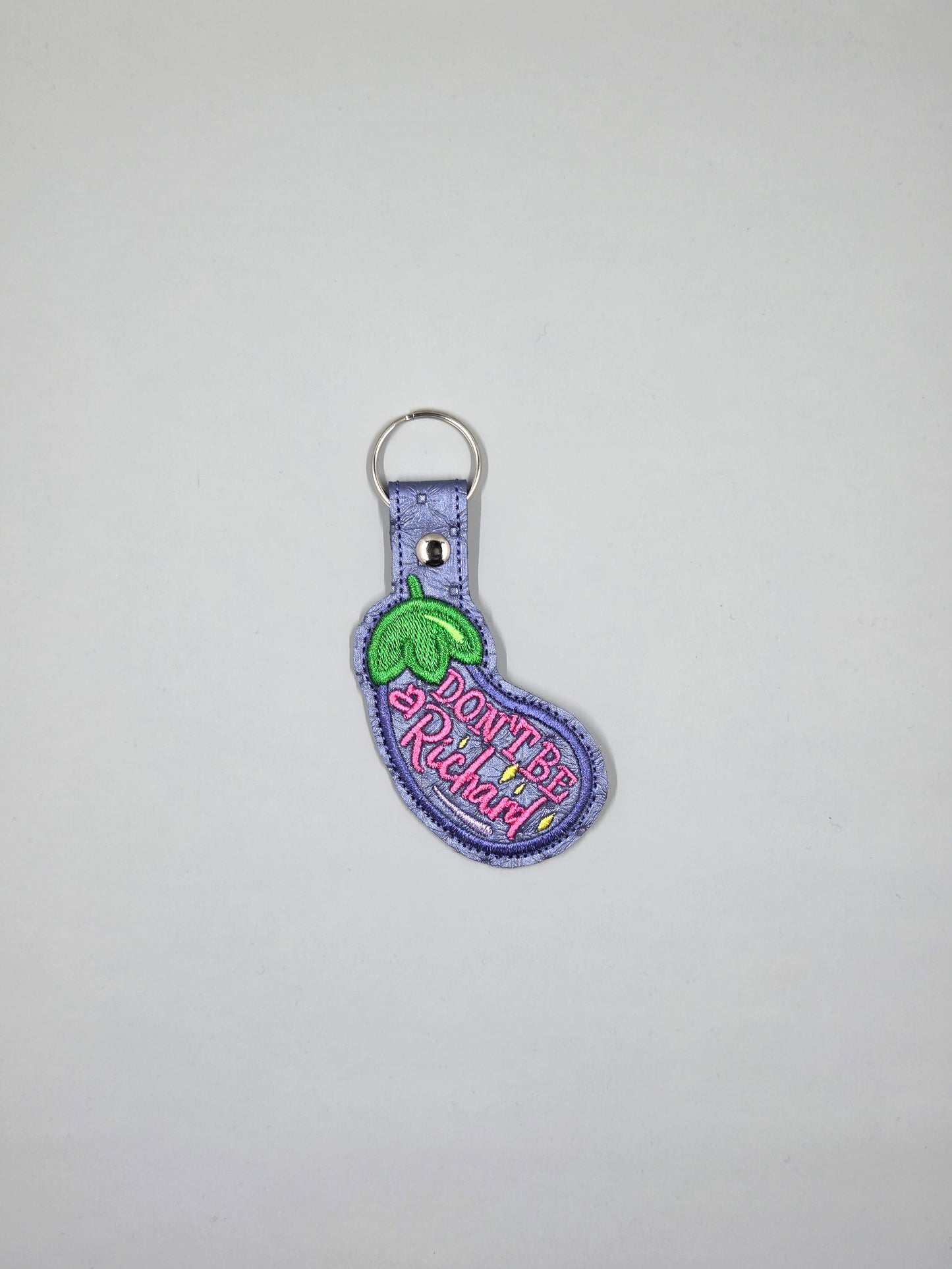 “Don’t Be a Richard” Embroidered Keychain | Funny Eggplant Vinyl Keychain