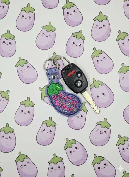 “Don’t Be a Richard” Embroidered Keychain | Funny Eggplant Vinyl Keychain