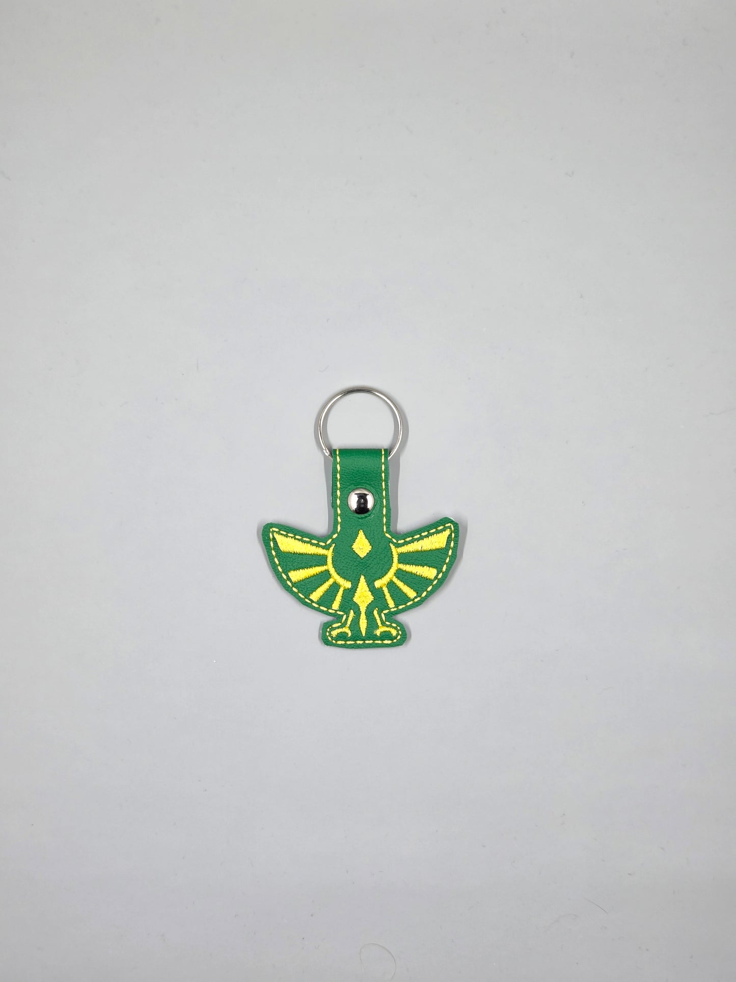 Hylian Crest Embroidered Keychain | Green & Gold Vinyl Gamer Keychain